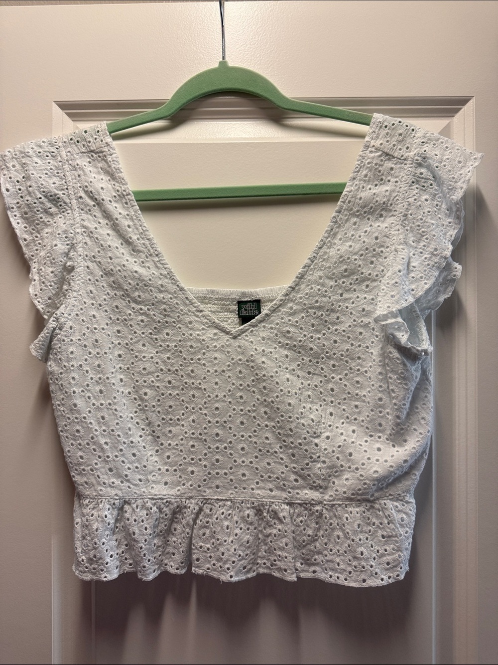 Women's White Eyelet Peplum V-Neck Top